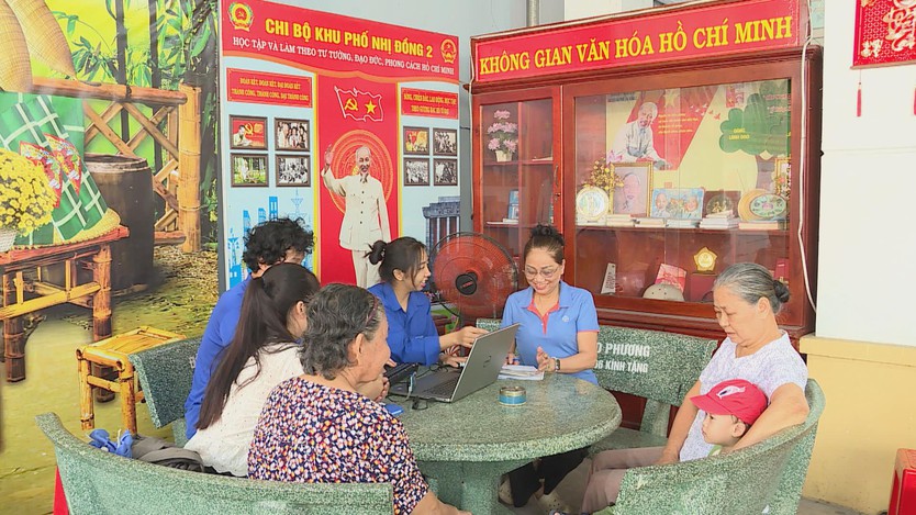 phường Dĩ An: Nhiều mô hình hỗ trợ giúp người dân thuận tiện thực hiện thủ tục hành chính - Ảnh 3.