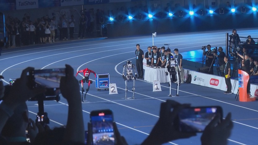 Robot hình người chạy nhanh hơn Usain Bolt - Ảnh 1.