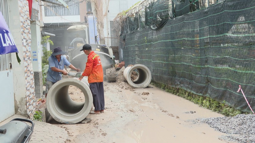 Nhân dân TP. Hồ Chí Minh chung tay mở hẻm, chung sức dựng xây đô thị - Ảnh 2.
