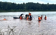 Tìm thấy ô-tô của người phụ nữ tử vong do bị nước cuốn ở hồ Xa Cát