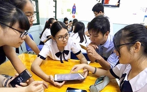 Phải giúp các em ứng xử đúng với điện thoại thông minh
