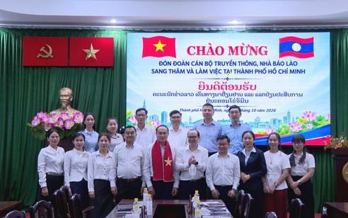 TP. Hồ Chí Minh chia sẻ kinh nghiệm chuyển đổi số báo chí với đoàn nhà báo Lào